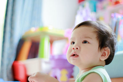 The cute asian boy toddler are looking for his toy. portrait cute asian baby.