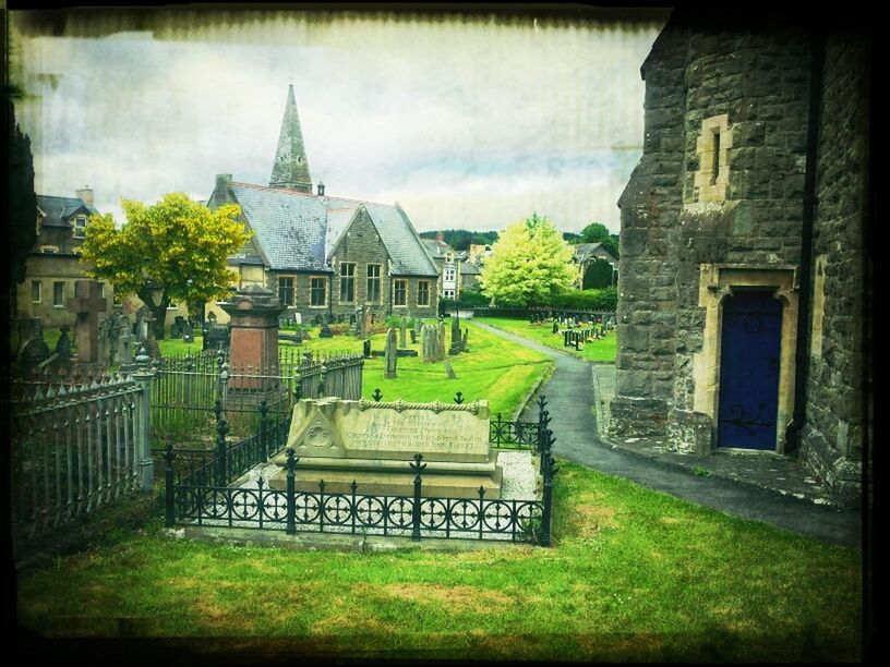 transfer print, building exterior, architecture, built structure, auto post production filter, sky, house, grass, tree, cloud - sky, church, residential structure, green color, day, cloudy, religion, outdoors, old, cloud, history