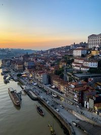 Old town porto from ponte luis i bridge. ribeira riverside along douro river. sunset, golden hour. 