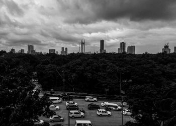 High angle view of buildings in city against sky