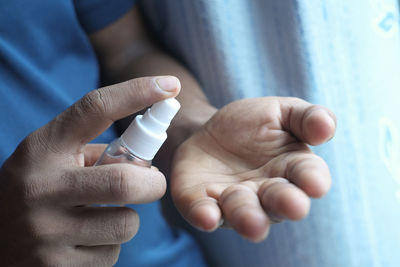 Close-up of people holding hands