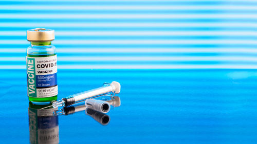 Close-up of water bottle on table