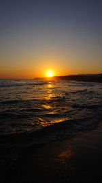 Scenic view of sea against sky during sunset