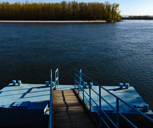 High angle view of pier over lake against sky
