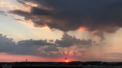 Scenic view of dramatic sky during sunset