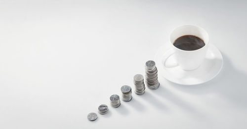 High angle view of coffee cups on table