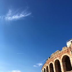 Low angle view of historical building against blue sky