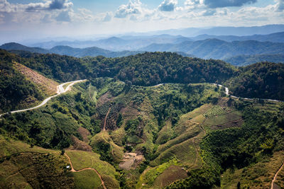 Aerial view landscape mountain valley and over road abstract background from drone camera