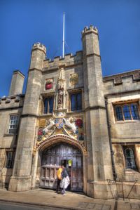 Low angle view of historic building against blue sky