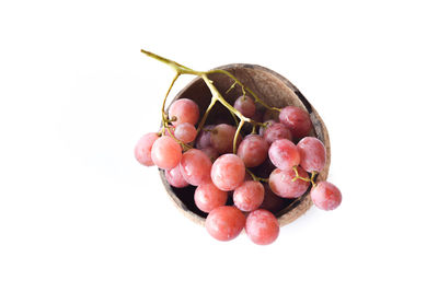 Close-up of grapes against white background