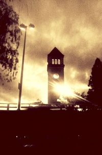 Low angle view of street light against sky