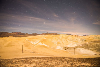 Scenic view of mountains at night