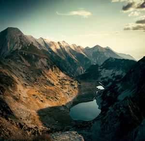 Scenic view of mountains against sky during sunset