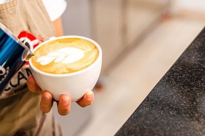 Midsection of coffee in cup