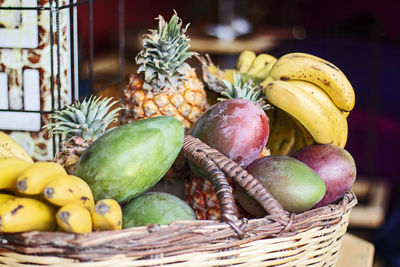 Fruits in basket at market stall