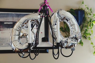 High angle view of bicycles on table against wall