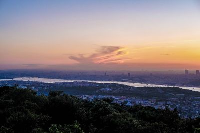 High angle view of cityscape against sky during sunset