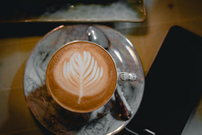 High angle view of coffee on table