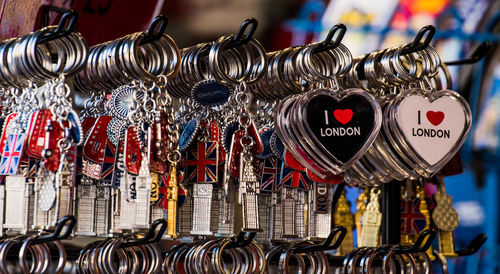 Close-up of clothes hanging in store for sale