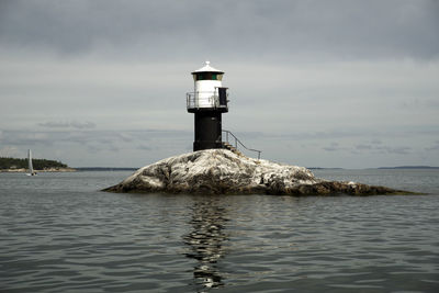 Lighthouse on rocky island