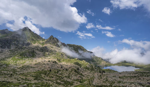 Scenic view of rocky mountains against sky