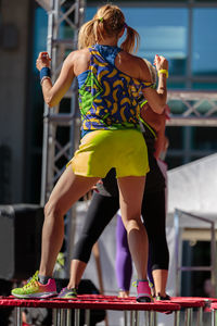 Full length of woman standing on stage