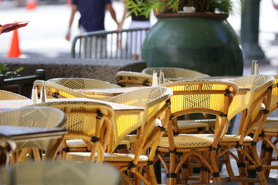 Empty chairs and tables at cafe