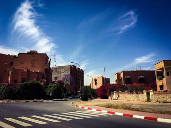 Street in town against sky
