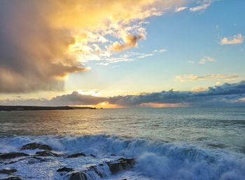 Scenic view of sea against sky during sunset