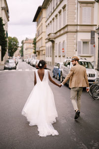 Full length of couple on road 