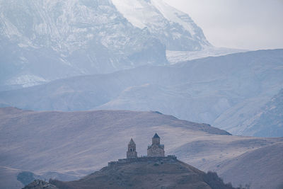 Scenic view of snowcapped mountain against sky