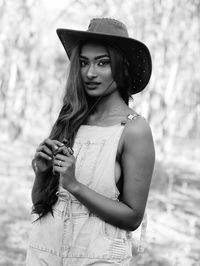 Portrait of a young woman wearing hat