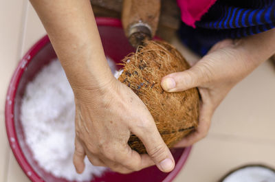 Close-up of man preparing food on table