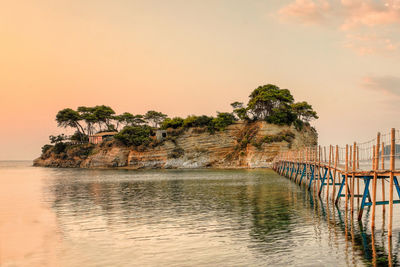 Scenic view of sea against sky at sunset