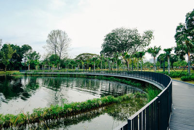 Bridge over canal against sky