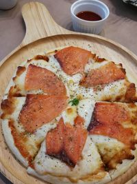 Close-up of pizza served on table