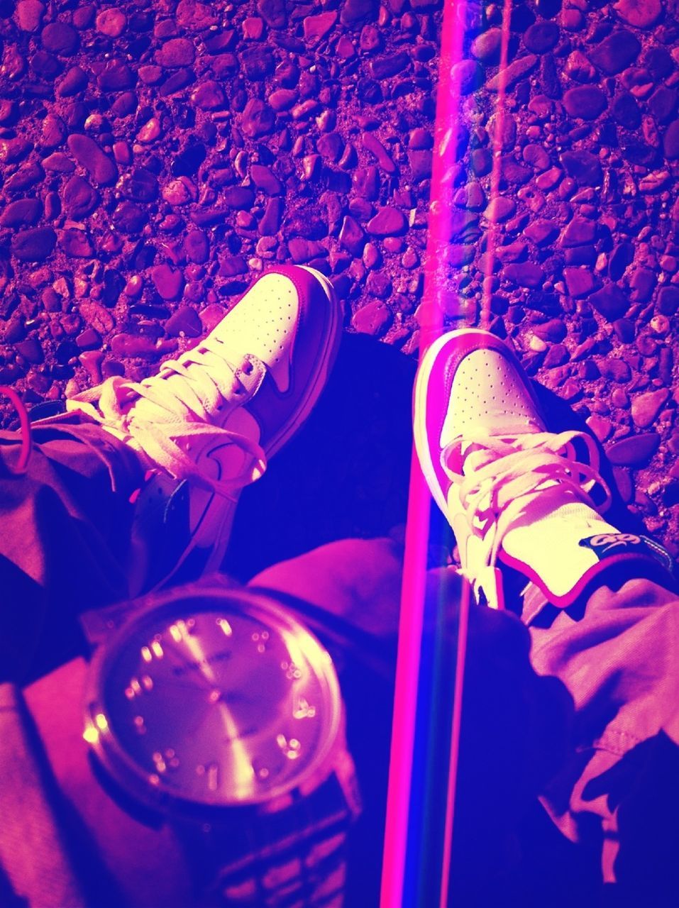 indoors, red, close-up, pink color, drink, table, selective focus, still life, glass - material, illuminated, multi colored, high angle view, transparent, drinking glass, night, person, light - natural phenomenon, shoe