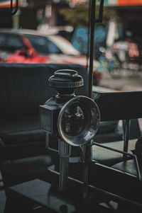 Close-up of vintage car on street