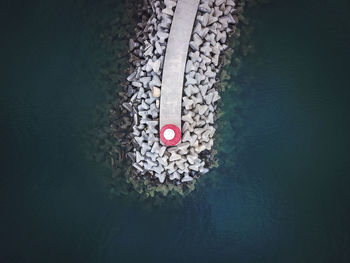 High angle view of groyne in sea