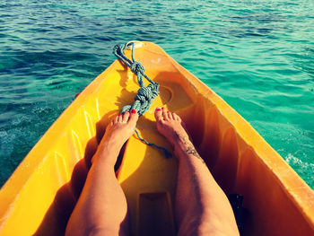 Low section of woman in boat