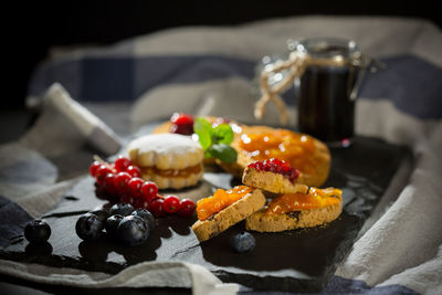 Close-up of fruits in plate on table