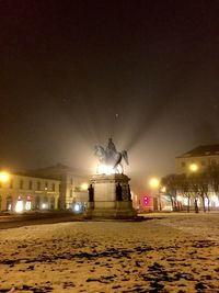 Illuminated street light at night