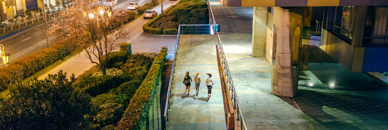 High angle view of people walking on street