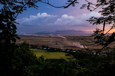 View of landscape against cloudy sky