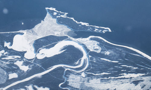 Aerial view of snow covered landscape