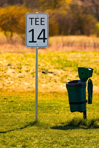 Notice sign tee 14 as a guide to the tee off at the green on a golf course in germany