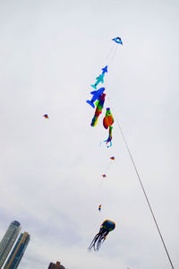 Low angle view of kite against sky