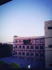 Low angle view of built structure against blue sky