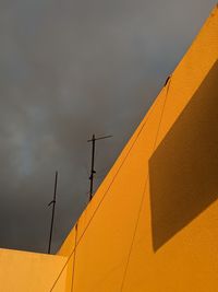 Low angle view of building against sky during sunset