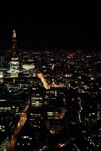 Illuminated cityscape at night